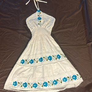 white halter dress with blue flowers